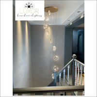 Perilly Gold Staircase Chandelier - chandeliers